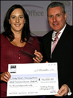 Vicky Ward receiving her award by Vernon Coaker MP