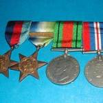 Tom Morgan's medals. He is very proud of the second medal.