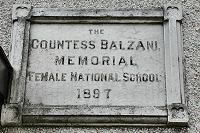 Plaque on wall of National School