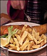Janet tucking into her fish and chips