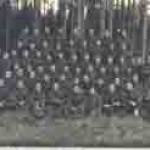 George is in the second Row above the man with his dog