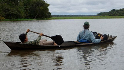 Keith and Dudu in their canoe