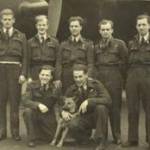 End-of-tour crew photo under Halifax "B" 1944. "Butch" Lewis kneeling left.