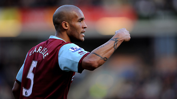 Clarke Carlisle in action for Burnley.