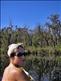 Another view of the mirror water showing the gum trees. Claire is canoeing on the Noosa Everglades