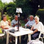 left to right:- Marjorie Williams, Harold Williams, Emil Weingartner and Edna Weingaernter chatting in the garden at Stowmarket. 2004