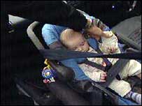 Car sear being checked for correct fitting