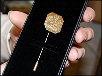 Gold pin for Charles, Prince of Wales