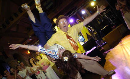 The audience at the Jive Aces gig are treated to so acrobactic, rock and roll dancing. 