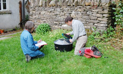 Ralph and Liz Sheppard examining their moth haul.