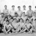 John Darlington Bruce (back row, 2nd in from right) on shore leave at Sri Lanka in November 1944. He wrote on the back of this photograph “What a War!”.