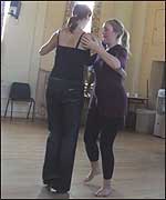 Laura concentrates hard