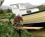 Traditional boat builder John MacAulay at work