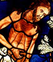 Stained glass window of Adam working in the Garden of Eden