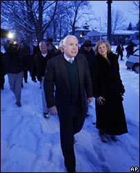 John McCain in the snow early on polling day in Michigan