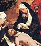 Mary, depicted in black garments, grieving over the body of Jesus, which has just been taken down from the cross