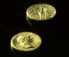 An image of two coins from Vindolanda
