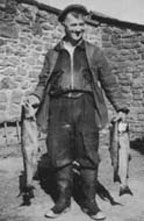 Roger's dad with two salmon