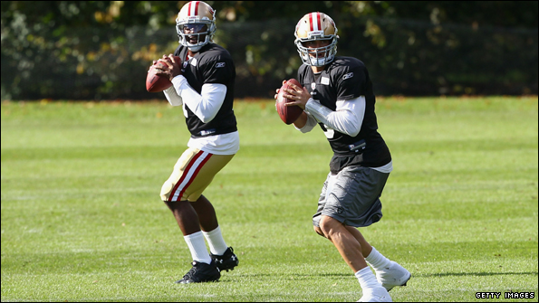 Troy Smith (L) was announced as starting quarterback for Sunday's game. David Carr (R) was widely expected to take the injured Alex Smith's place.
