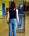Girl looking in mirror