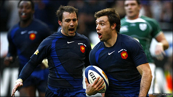 France wing Vincent Clerc celebrates scoring one of his hat-trick of first-half tries in the 2006 fixture.jpg