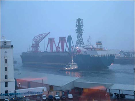 Osprey passes North Shields with its cargo of Swan Hunter cranes. Photo: Barry Martin