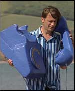Chris Packham with a giant phone