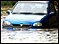 Car stuck in floods.