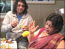 Shamir and Mrs Nirmal taste Indian food