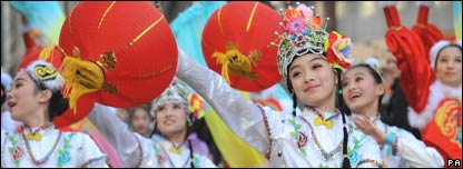 Chinese dancers in traditional costumes