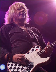 Rick Parfitt on stage at Whitehaven