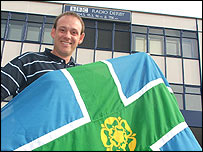 Andy Whittaker with the Derbyshire flag