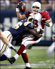 Kurt Warner gets sacked against the Rams