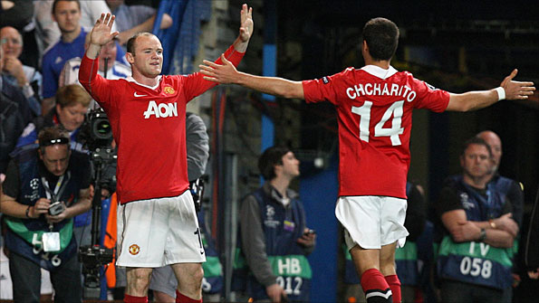 Wayne Rooney celebrates his goal with Javier 'Chicharito' Hernandez