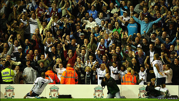 Young celebrates with the Aston Villa fans, who came under criticism from O'Neill