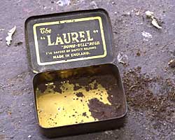 An empty tobacco tin