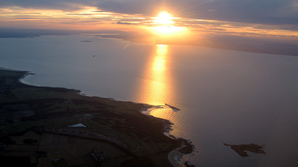 Aerial view, sun setting over Firth of Forth