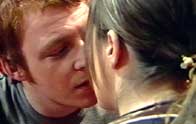 Hazel and Vader kiss