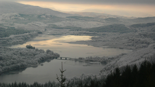 winter landscape with snow filled forrest and river (pic courtesy of Bev Tromp)