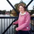 Kirsty on a bridge over the river