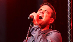 Robbie Williams performs at BBC Electric Proms 2009