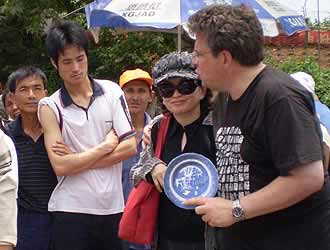 Lars with interpreter, Fumei Williams, in Boyang Market.