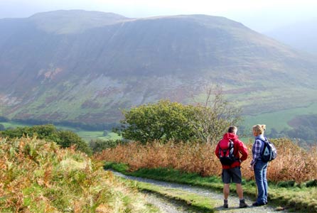 Derek and Lisa take a breather and look over the mountains towards the Bala fault line: