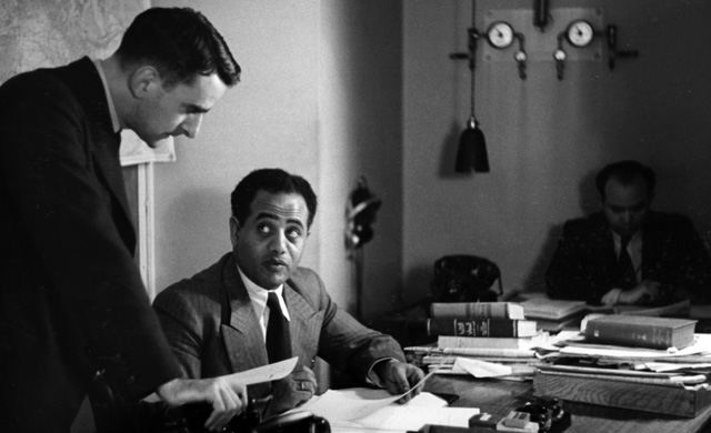 BBC Arabic sub-editor D Stephenson (left) and HMDA Souki relief translator and announcer (right) in 1938