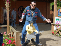 An Elvis fan with a Presley statue