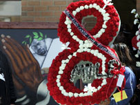 Mourner at Proof's funeral