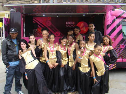 Dee and Rav with dancers at the Bradford Mela 2008