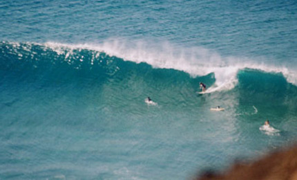 Martin A mails a few pics from the surf and sun of the Canary Islands. This amazin wave breaks all the way down the coastal side of a volcano. Mart and Dangerous Dave head back to the Canaries later this month. 1/07