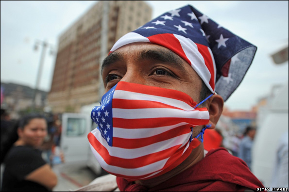 Man wearing US flag mask 