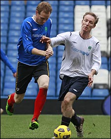 Dan Walker powers past the Right Honourable Jim Murphy at Stamford Bridge